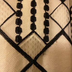 Dress with jeweled neckline